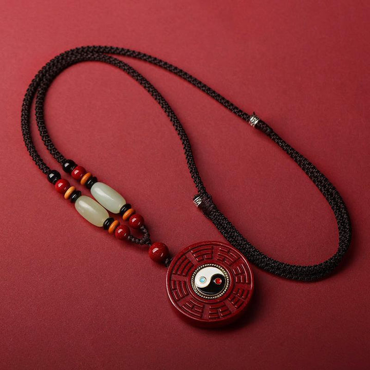 Natural Cinnabar Eight-Diagram-Shaped Appetizer Pendant - BuddhaEnergyHealing